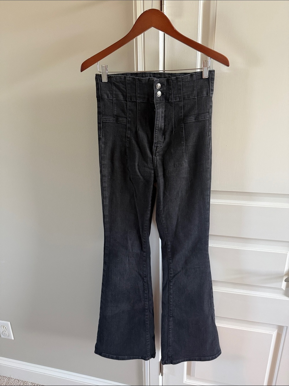 Free People High-Rise Black Flared Jeans with Waist Pleat Detail